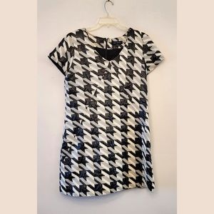 Beautiful gently worn sequin faux leather dress with pockets. Size 12